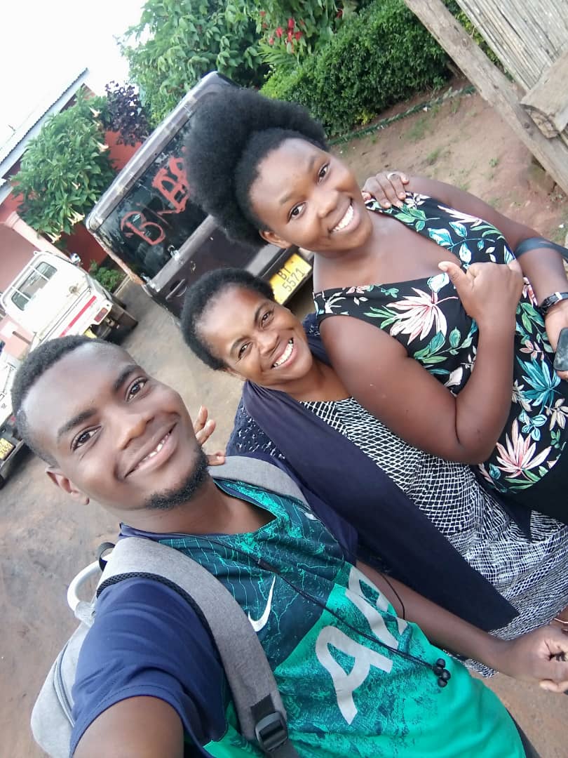 Godfrey and Sangwani, with their mentor Margaret. Photo credit: Plan International Malawi.